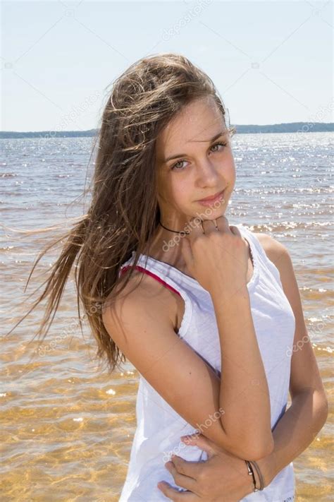 Cute Young Girl At The Beach Looking At Camera And Having Fun High-Res. . Teen nude beach pic